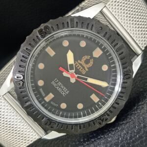 Vintage 1974 Titus Manual Mens Silver Watch W/Steel Strap & Orange accents